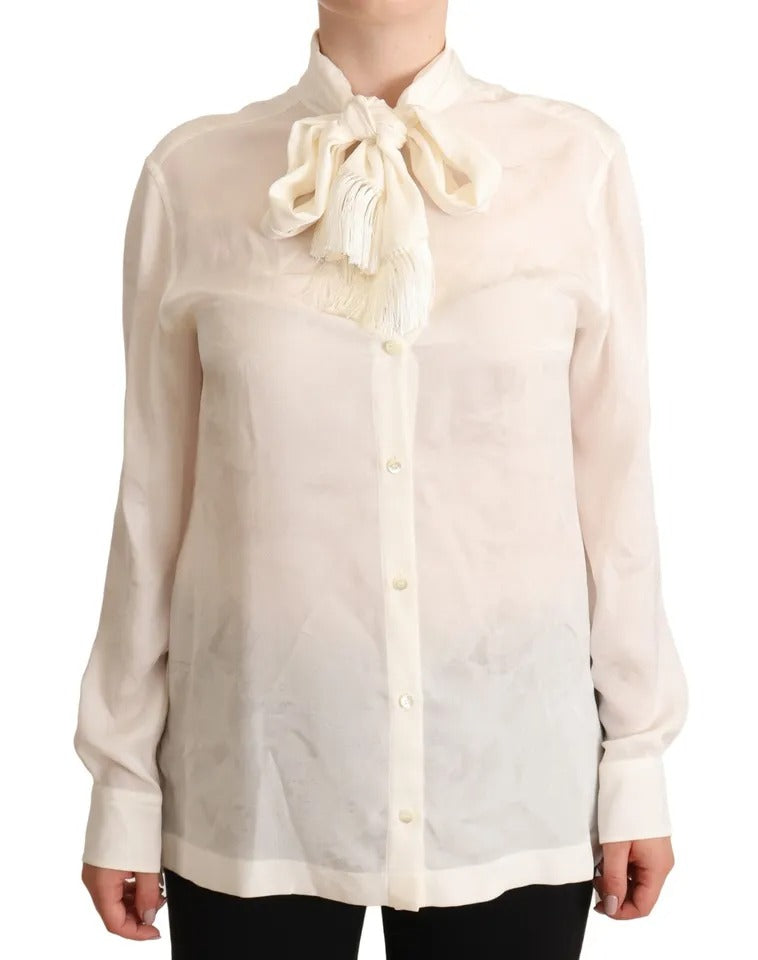 Indulge in the exquisite Dolce & Gabbana White Blouse, a silk and viscose masterpiece that embodies timeless elegance and versatile luxury for every occasion.