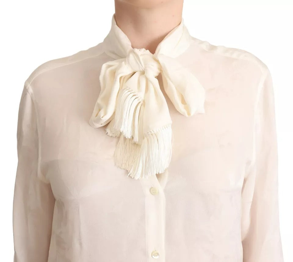 Elevate your wardrobe with the Dolce & Gabbana White Blouse, a silk and viscose masterpiece, embodying timeless elegance and sophisticated allure for every occasion.