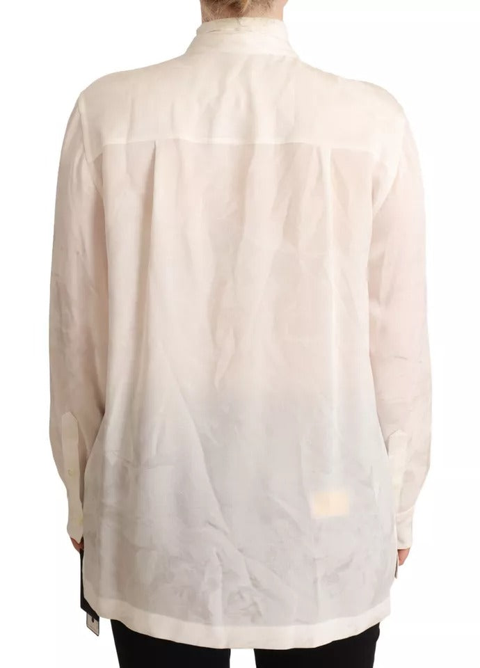 Elevate your wardrobe with the Dolce & Gabbana White Blouse, a silk and viscose masterpiece that embodies timeless elegance and sophisticated allure for every occasion.