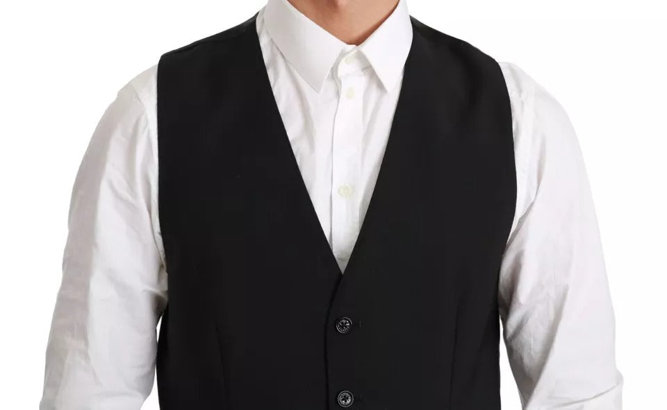 Elevate your wardrobe with the Dolce & Gabbana Black Stretch Waistcoat, a masterpiece of Italian craftsmanship blending virgin wool and elegance for timeless sophistication.
