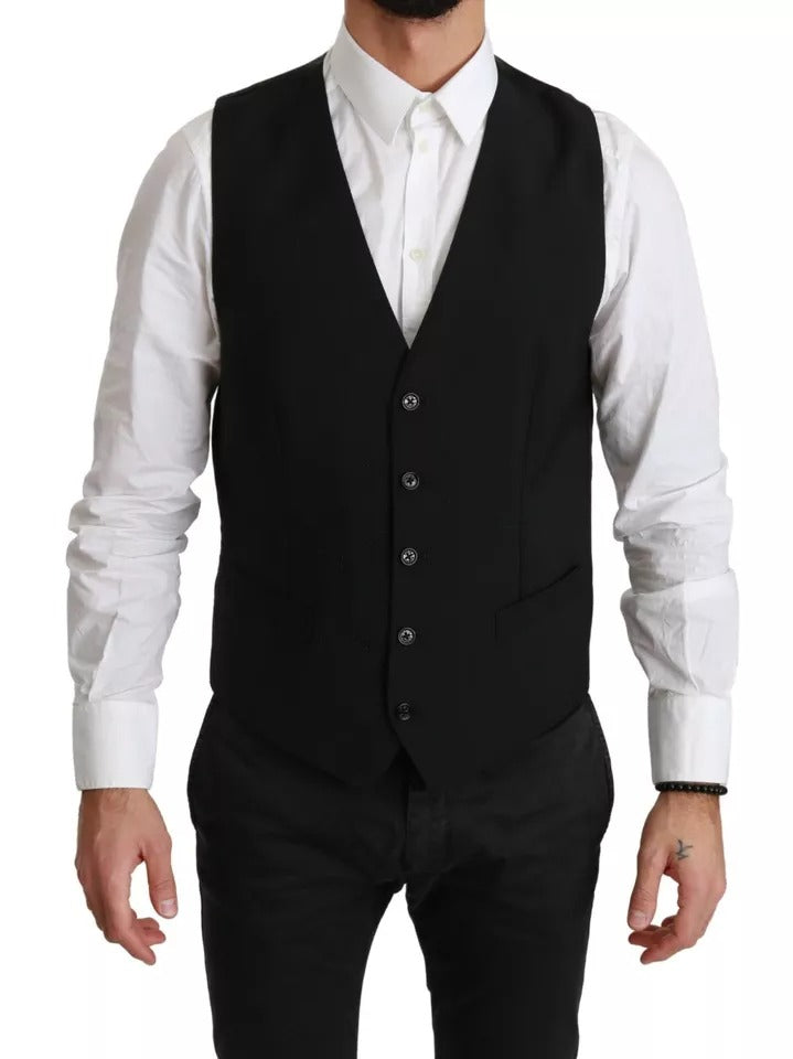 Elevate your wardrobe with the Dolce & Gabbana Black Stretch Waistcoat, a timeless blend of virgin wool and elegance, embodying luxury and sophistication for the discerning individual.