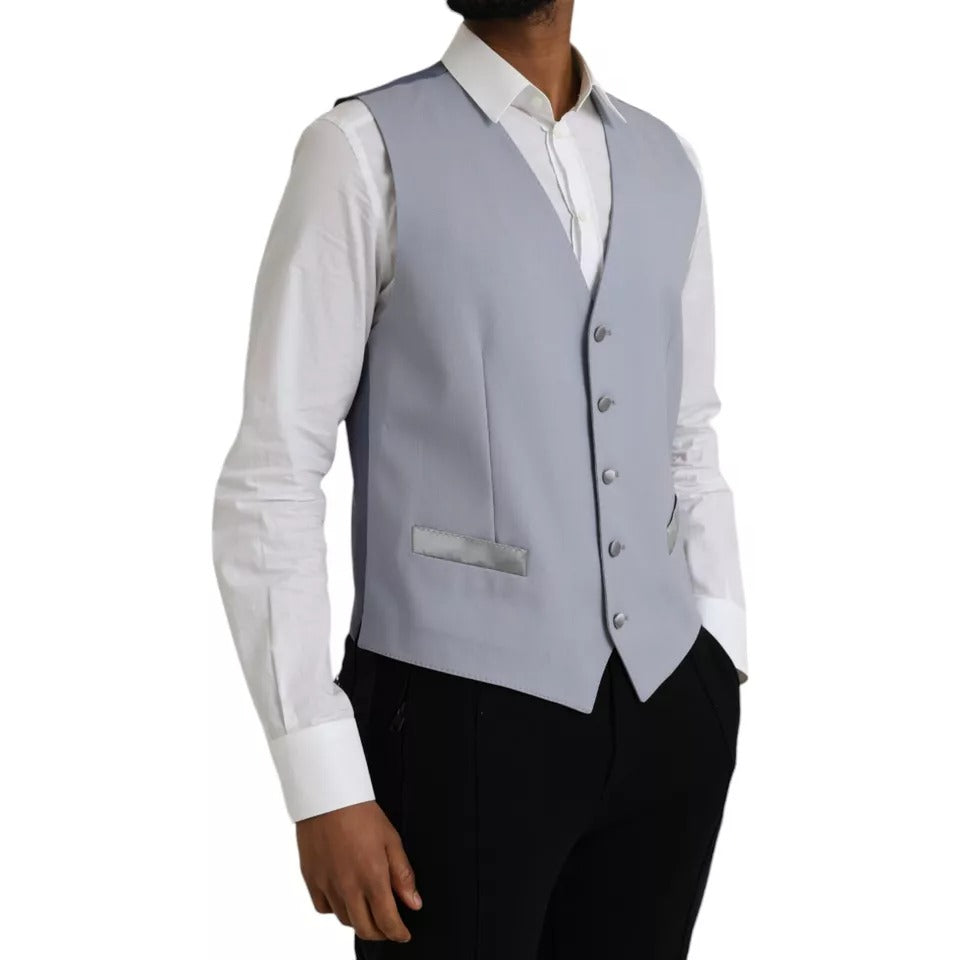 Experience the allure of the Dolce & Gabbana Light Blue Wool Formal Dress Waistcoat Vest, where luxurious craftsmanship meets timeless elegance, perfect for any discerning wardrobe.