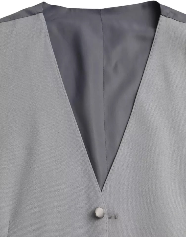 Experience the allure of Dolce & Gabbana's Light Blue Wool Formal Dress Waistcoat Vest, a masterpiece of luxury craftsmanship, embodying timeless elegance and sophistication.