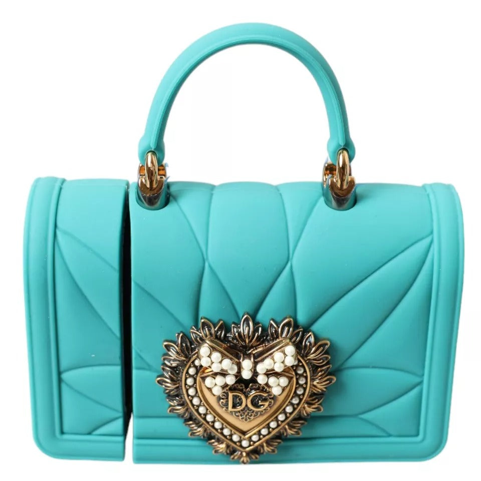 Indulge in the exquisite Dolce & Gabbana Turquoise Silicone Devotion Heart Bag Cover, a luxurious blend of Italian craftsmanship and timeless elegance, perfect for any sophisticated ensemble.