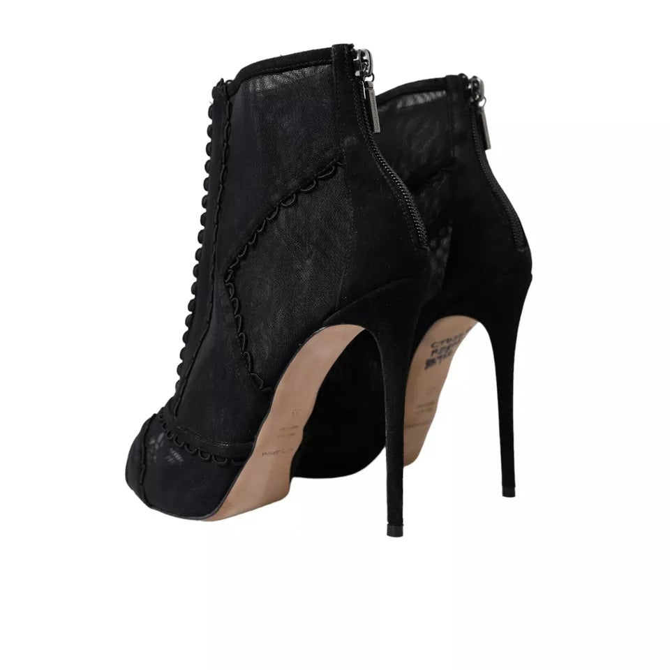 Indulge in the elegance of Dolce & Gabbana's Black Tulle Stiletto Heels, where exquisite craftsmanship meets luxurious materials for a timeless statement of sophistication.