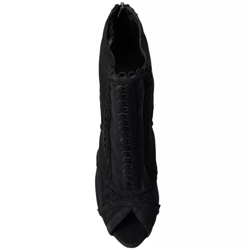Indulge in the exquisite allure of Dolce & Gabbana's Black Tulle Stiletto Heels, where luxurious craftsmanship meets timeless elegance for the discerning individual.
