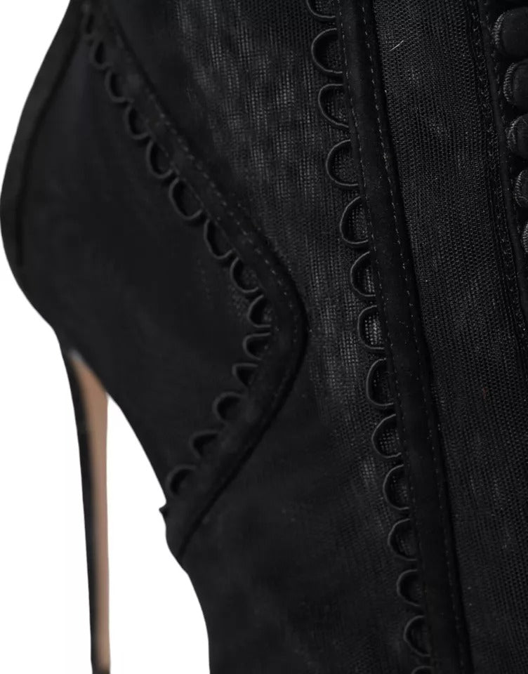 Indulge in the exquisite allure of Dolce & Gabbana's Black Tulle Stiletto Heels, where luxurious craftsmanship meets timeless elegance for the discerning individual.