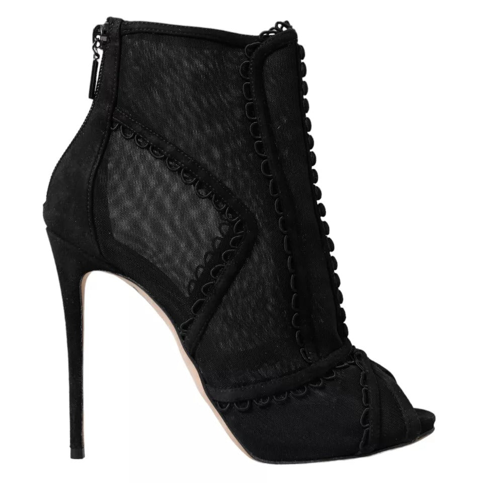 Elevate your elegance with Dolce & Gabbana's Black Tulle Stiletto Heels, a masterpiece of Italian craftsmanship that embodies timeless luxury and sophisticated allure.