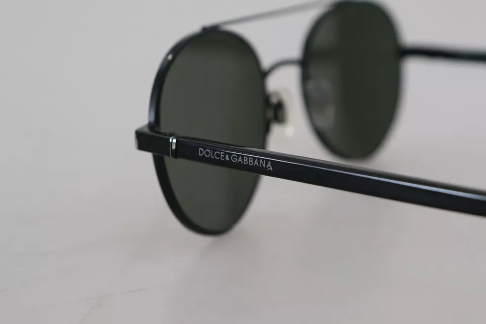 Indulge in the allure of Dolce & Gabbana DG2245 sunglasses, where exquisite matte black steel meets vibrant green lenses, embodying timeless elegance for the discerning connoisseur.