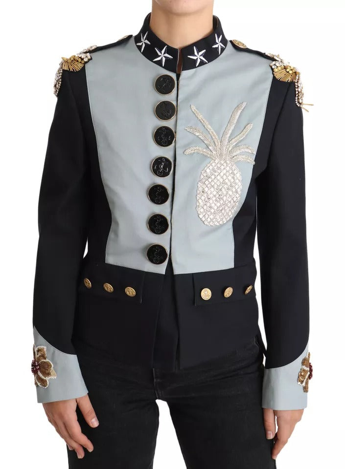 Discover the Dolce & Gabbana Blue Button Crystal Embellished Cotton Jacket, a luxurious blend of cotton and silk, embodying exquisite craftsmanship and timeless elegance for the discerning individual.