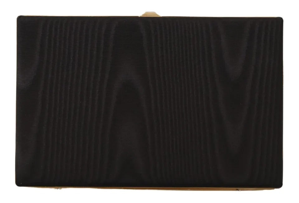 Indulge in the exquisite allure of the Dolce & Gabbana Black Silk Gold Frame Clutch, a masterpiece of Italian craftsmanship that elevates any evening ensemble with timeless elegance.