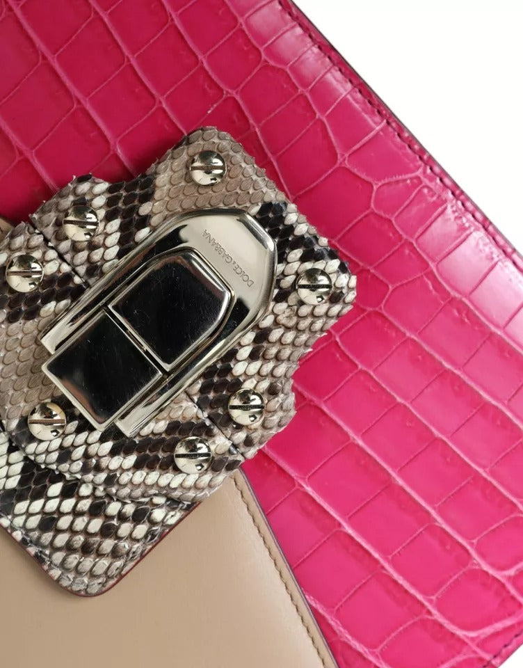 Indulge in the exquisite Dolce & Gabbana Multicolor Leather LUCIA Shoulder Bag, a masterpiece of artisanal craftsmanship, blending luxurious crocodile, python, and calf leather for timeless elegance.