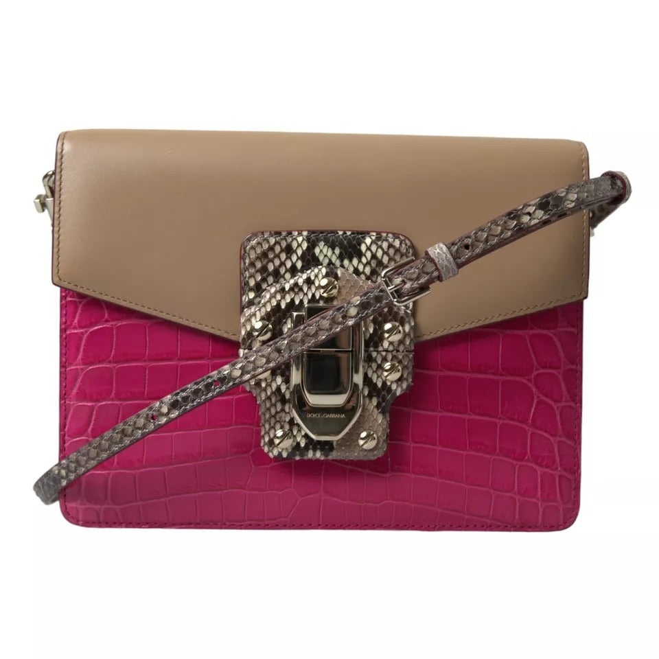 Indulge in the exquisite Dolce & Gabbana Multicolor Leather LUCIA Shoulder Bag, a masterpiece of artisanal craftsmanship blending luxurious crocodile, python, and calf leather.