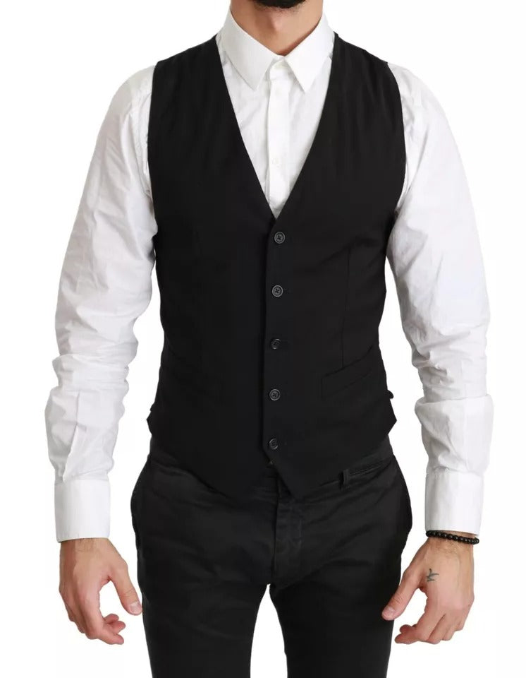 Discover the Dolce & Gabbana Black Solid STAFF Slim Fit Waistcoat Vest, a masterpiece of Italian craftsmanship blending luxurious materials for timeless elegance.