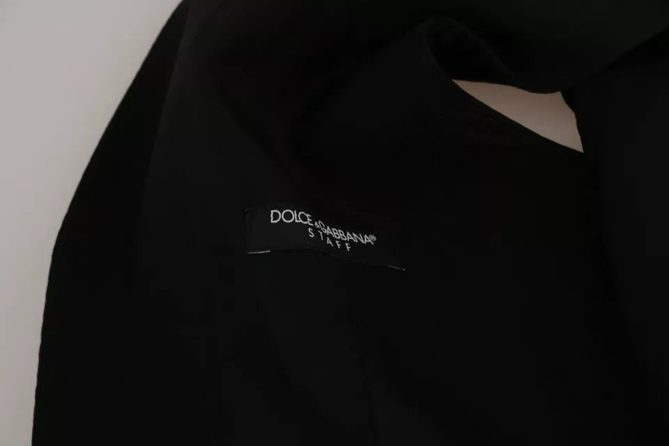 Discover the Dolce & Gabbana Black Solid STAFF Slim Fit Waistcoat Vest, a masterpiece of Italian craftsmanship blending luxurious materials for timeless elegance and sophistication.