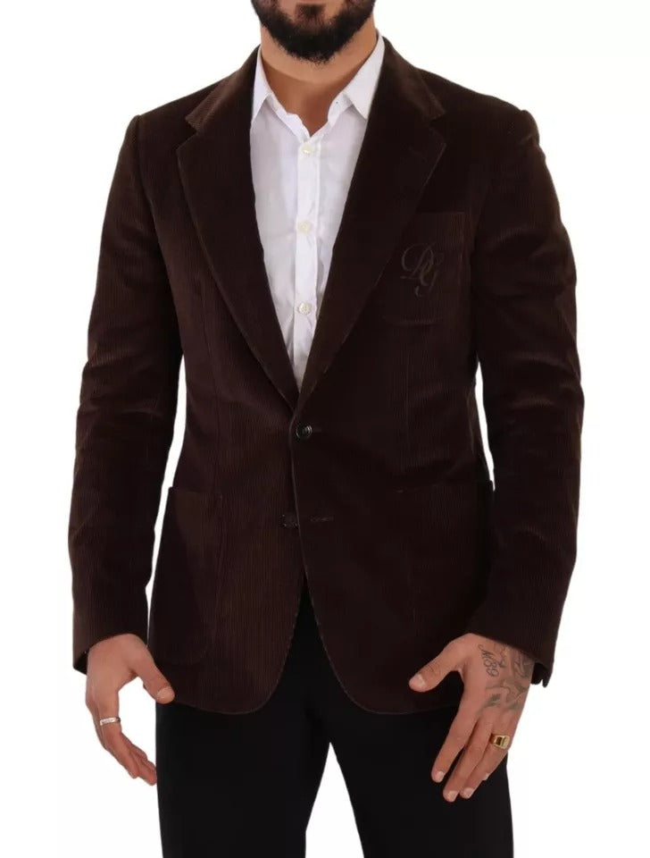 Discover the Dolce & Gabbana Brown Corduroy Slim Fit Coat, a masterpiece of Italian craftsmanship, blending luxury and elegance for the discerning individual.