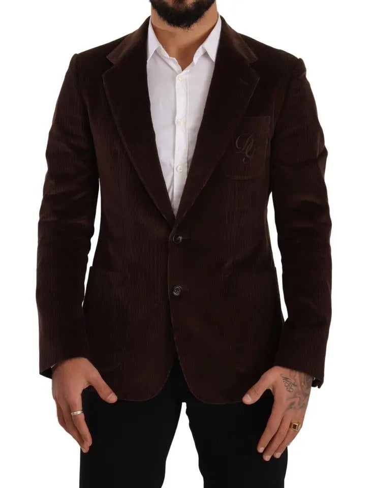 Discover the Dolce & Gabbana Brown Corduroy Slim Fit Coat, a masterpiece of Italian craftsmanship, blending luxurious cotton and silk for an exquisite silhouette.