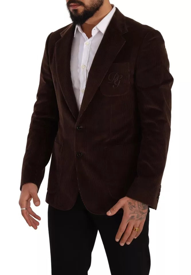 Discover the Dolce & Gabbana Brown Corduroy Slim Fit Coat, a masterpiece of Italian craftsmanship, blending luxurious cotton and silk for an elevated lifestyle.