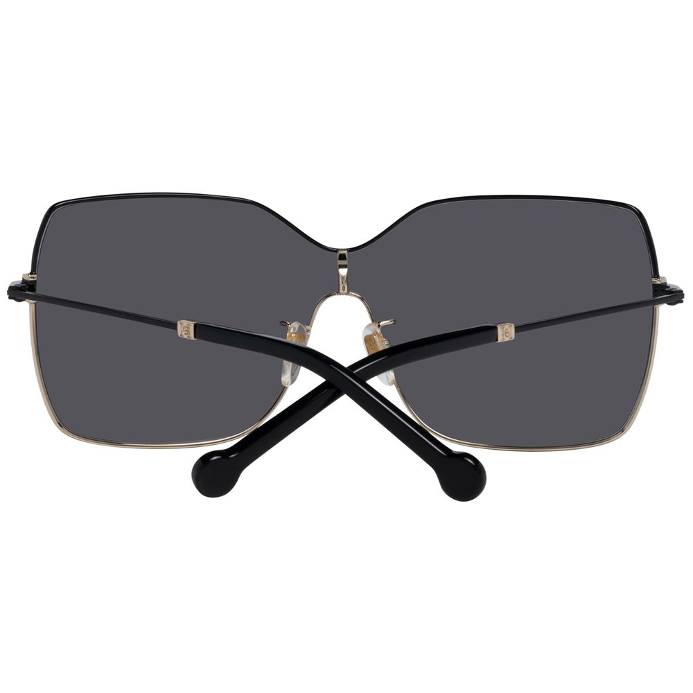 Indulge in the timeless elegance of Carolina Herrera Black Metal Sunglasses, where exquisite craftsmanship meets luxurious style for the discerning individual.