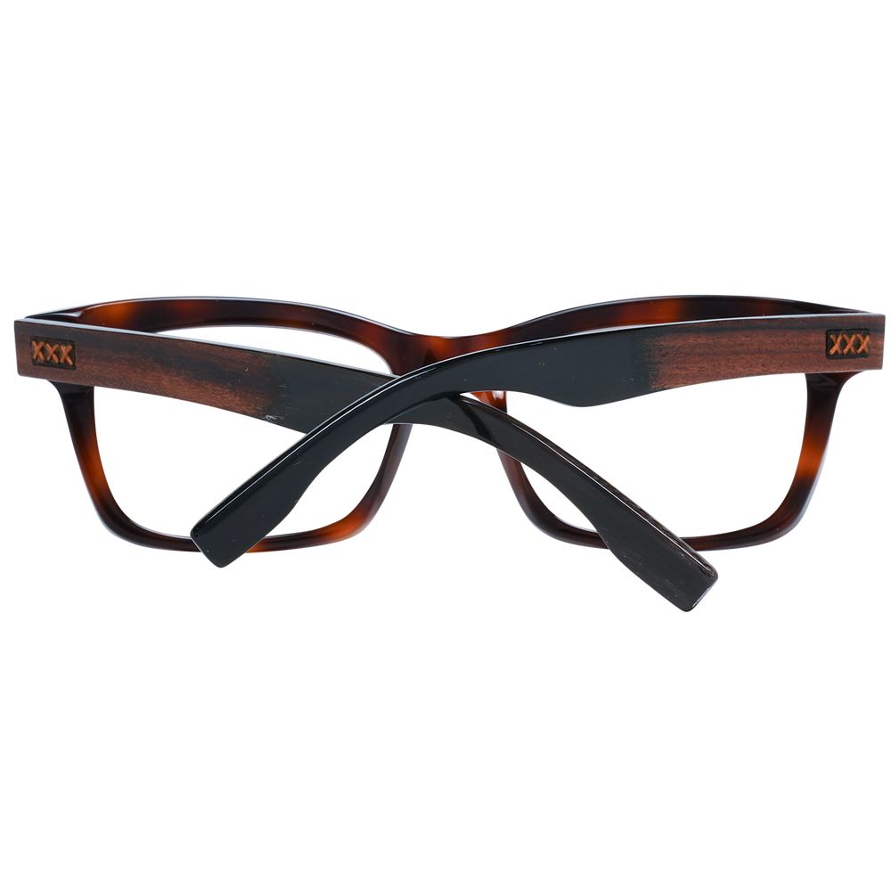 Experience the exquisite Ermenegildo Zegna Brown Plastic Glasses, where artisanal craftsmanship meets timeless elegance, elevating your style with every glance.