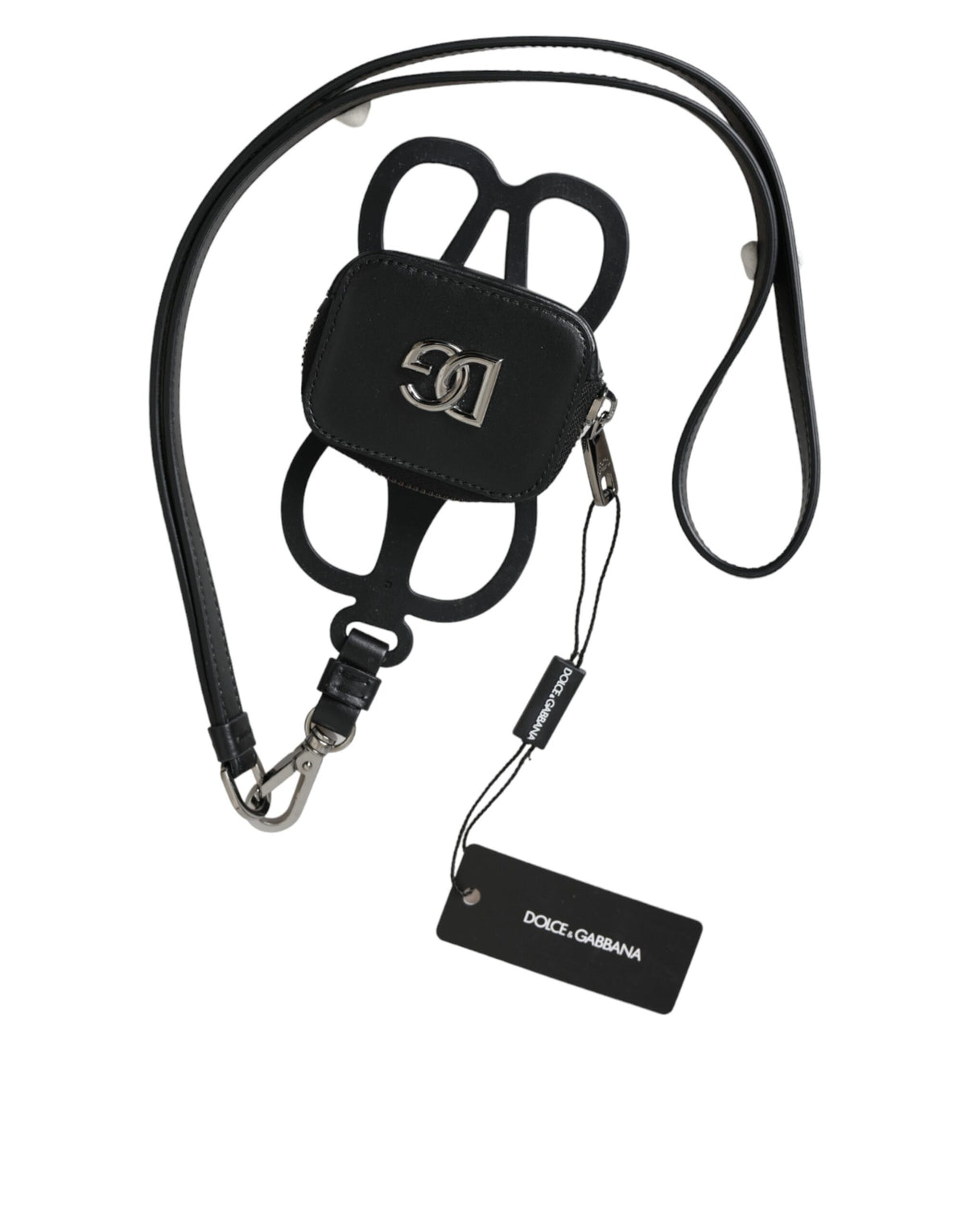 Indulge in the elegance of Dolce & Gabbana's Black Calfskin Leather DG Logo Coin Purse, a masterpiece of Italian craftsmanship designed for the discerning individual.