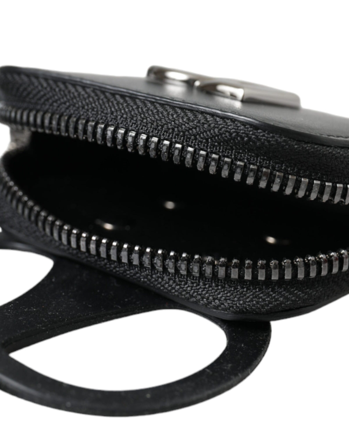 Elevate your style with the Dolce & Gabbana Black Calfskin Leather DG Logo Coin Purse, a masterpiece of Italian craftsmanship that embodies luxury and sophistication.