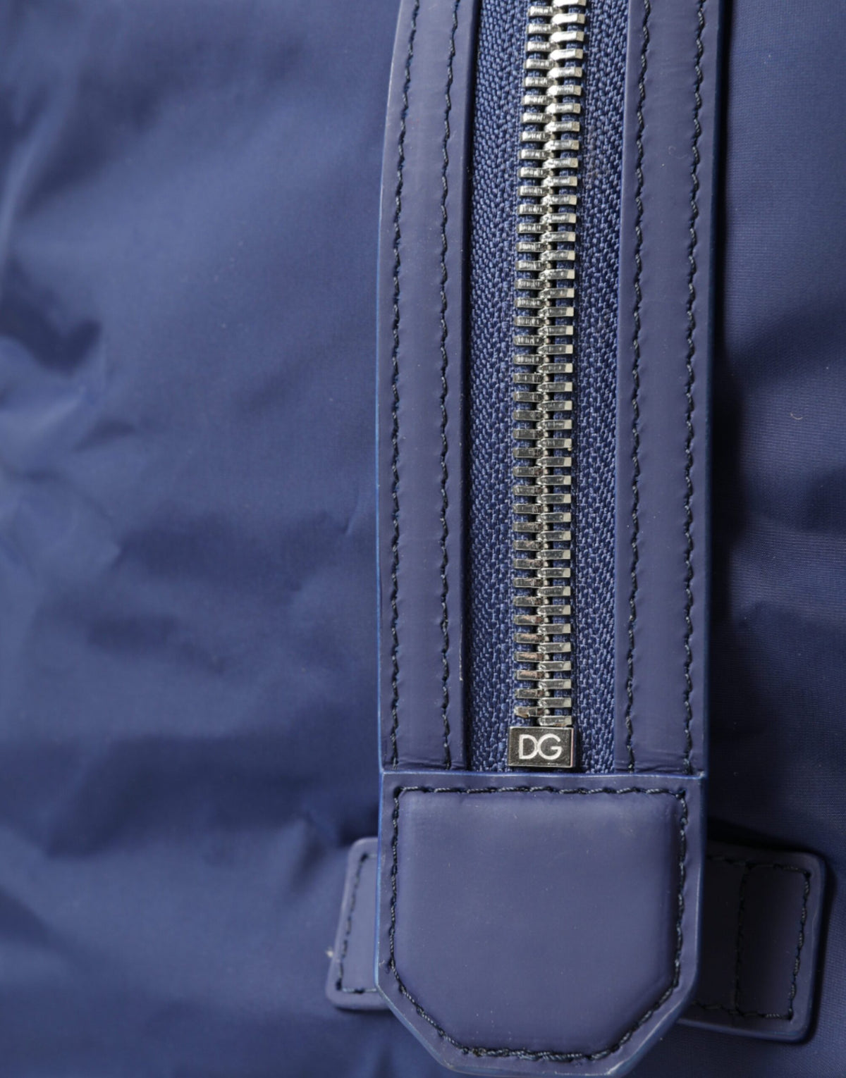 Elevate your travel experience with the Dolce & Gabbana Blue Nylon Calfskin Hand Shoulder Duffel Bag, a masterpiece of Italian craftsmanship blending luxury and style.