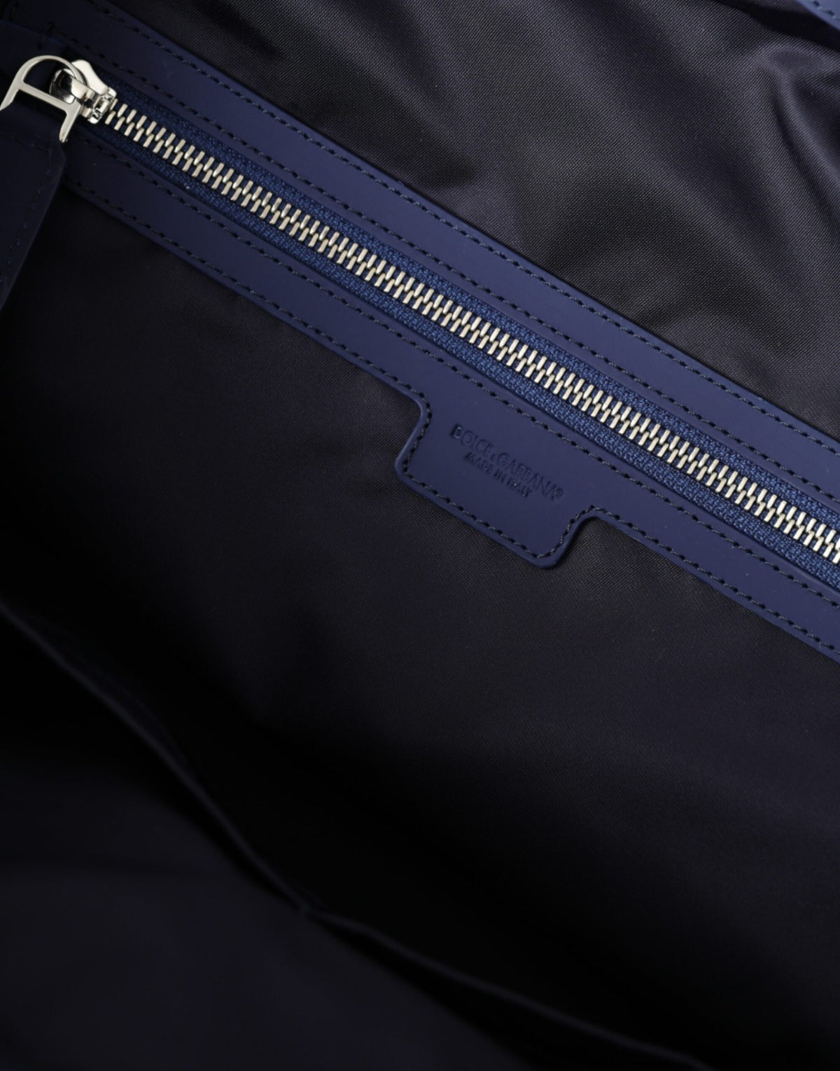 Discover the Dolce & Gabbana Blue Nylon Calfskin Hand Shoulder Duffel Bag, a luxurious blend of exquisite craftsmanship and sophisticated style, perfect for the discerning traveler.