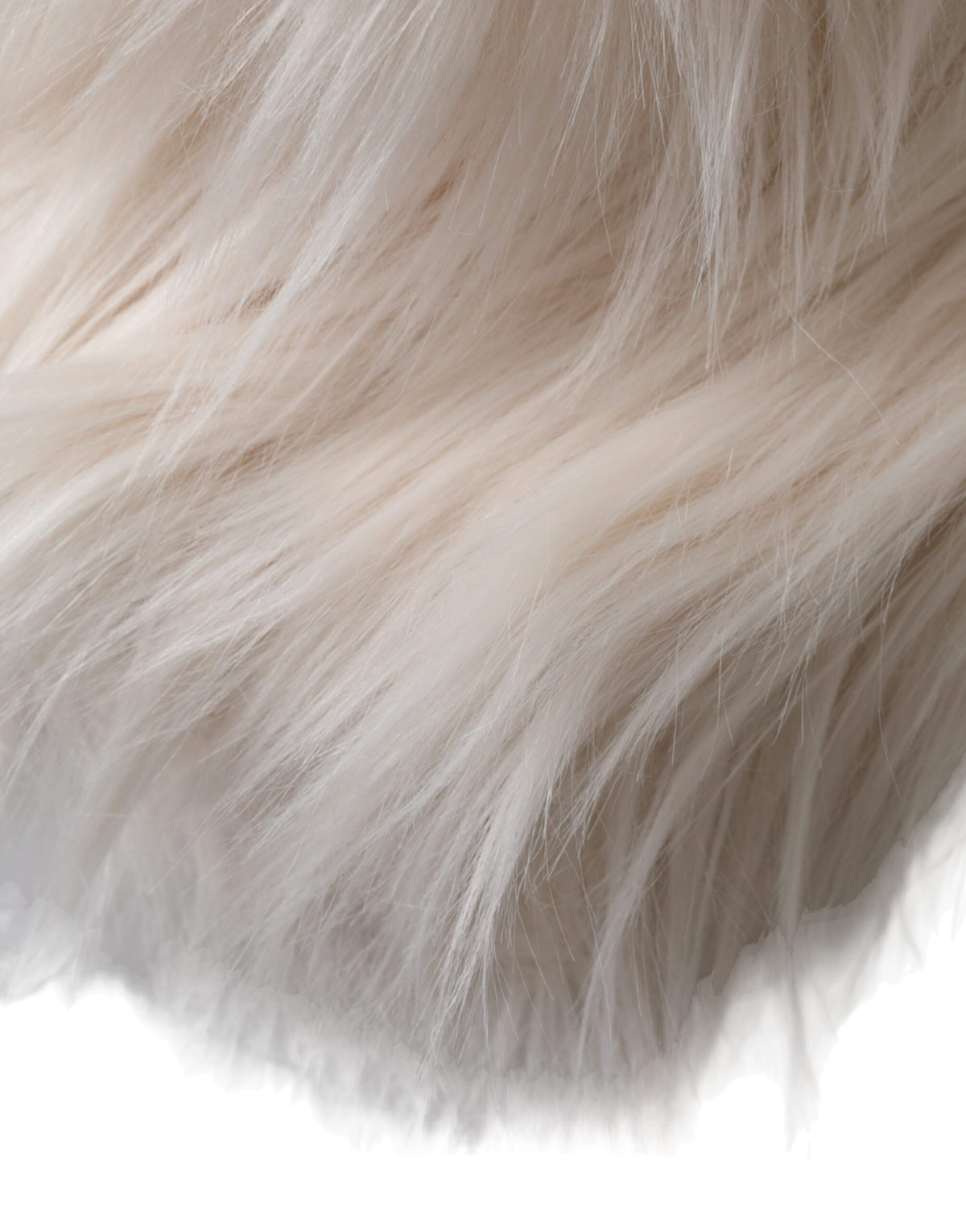 Indulge in the exquisite Dolce & Gabbana Off White Acrylic Fur Womens Bucket Hat, a luxurious statement piece that embodies artisanal craftsmanship and refined elegance.