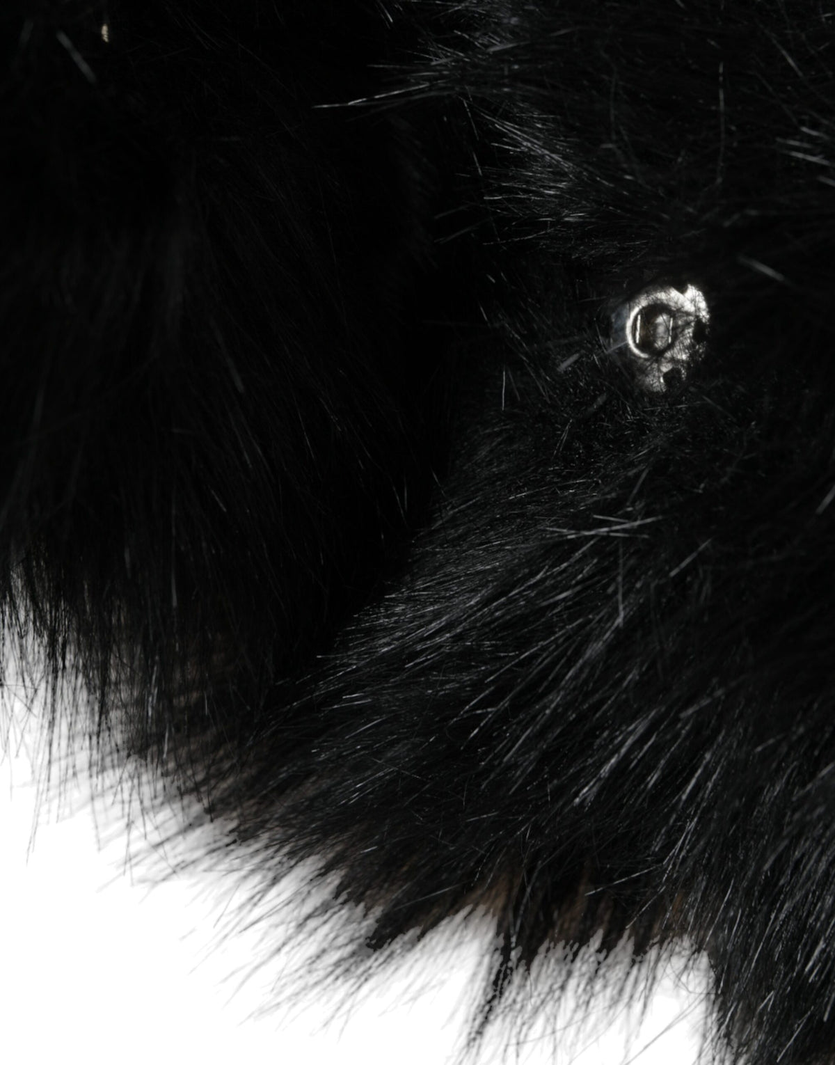 Indulge in the Dolce & Gabbana Black Faux Fur Whole Head Wrap Hat, a luxurious statement piece crafted in Italy, embodying timeless elegance and exquisite artistry.