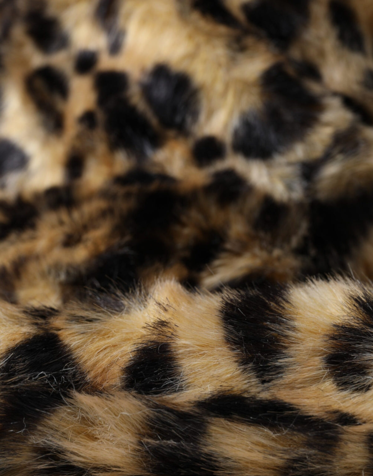 Discover the Dolce & Gabbana Brown Leopard Fur Bucket Hat, a masterpiece of luxurious craftsmanship and timeless elegance, perfect for the discerning individual.