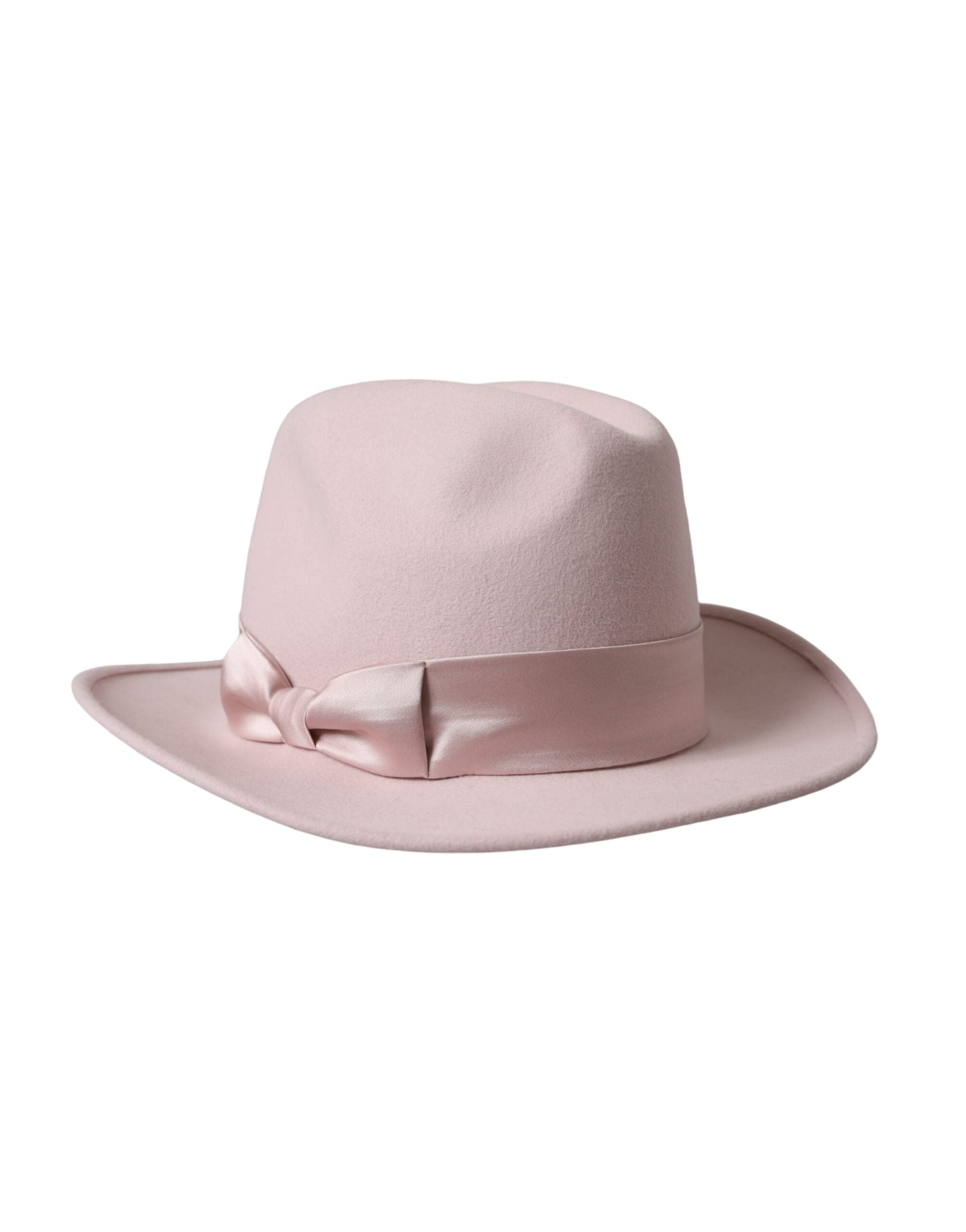 Experience the allure of the Dolce & Gabbana Pink Rabbit Fedora Trilby, a luxurious blend of rabbit fur and silk, expertly crafted in Italy for timeless elegance.