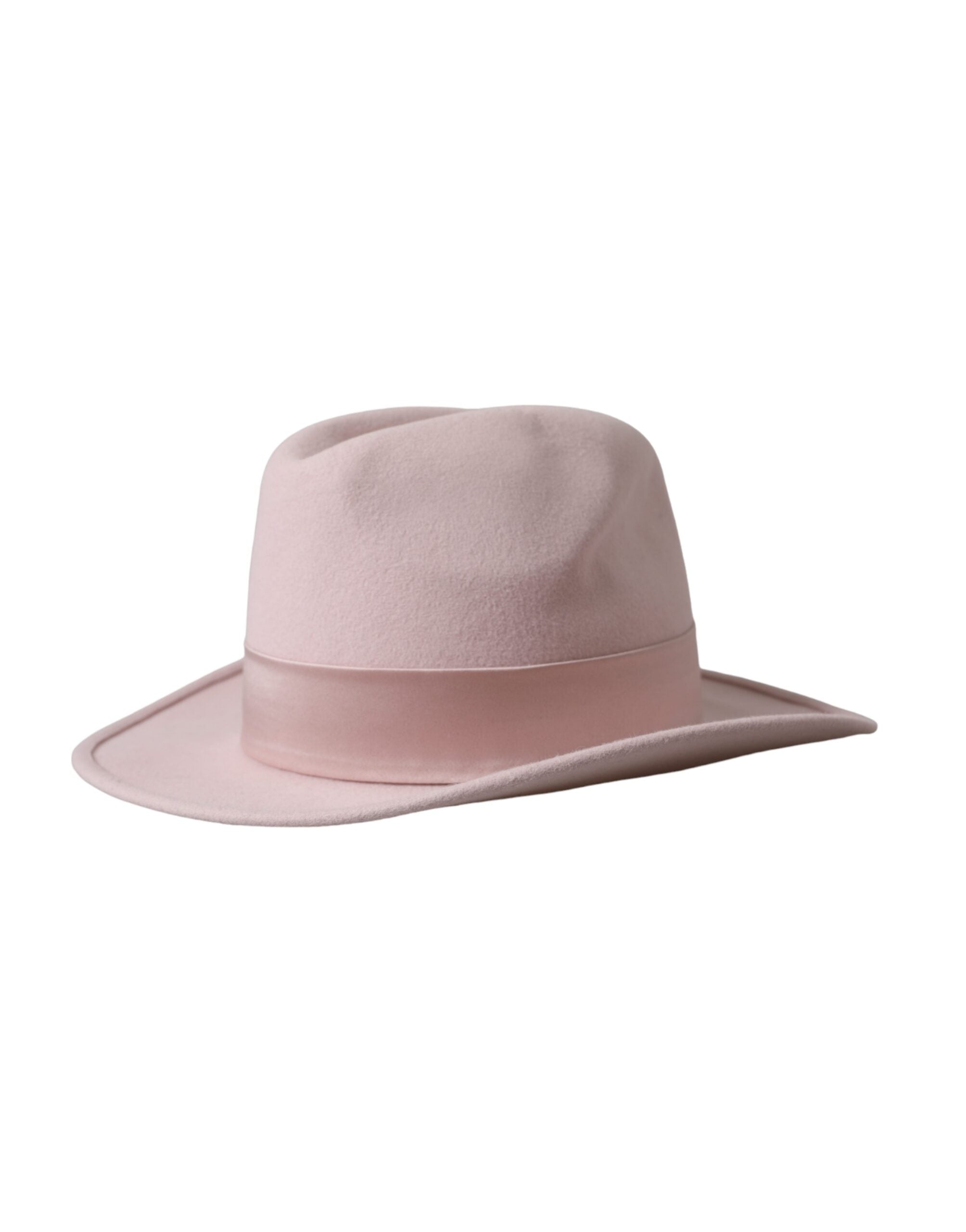 Experience the allure of the Dolce & Gabbana Pink Rabbit Fedora Trilby, a luxurious blend of rabbit fur and silk, expertly crafted in Italy for timeless elegance.