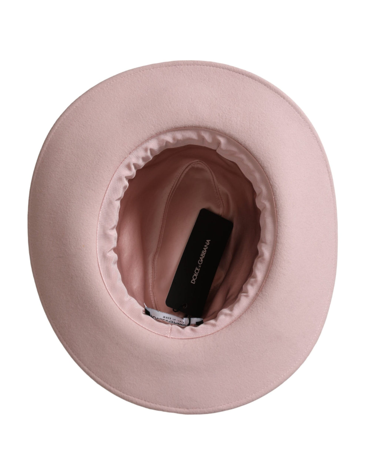 Discover the Dolce & Gabbana Pink Rabbit Fedora Trilby, a luxurious blend of rabbit fur and silk, expertly crafted in Italy for an elegant statement of sophistication.