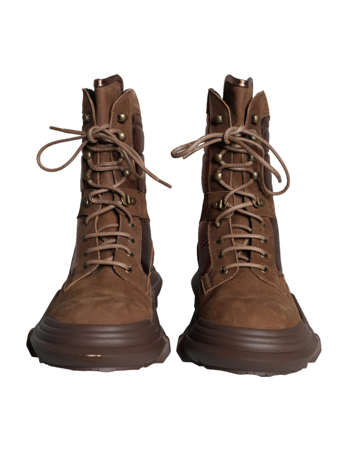 Indulge in the exquisite Dolce & Gabbana Brown Suede Leather Military Combat Boots, where luxurious craftsmanship meets audacious style for the discerning connoisseur.
