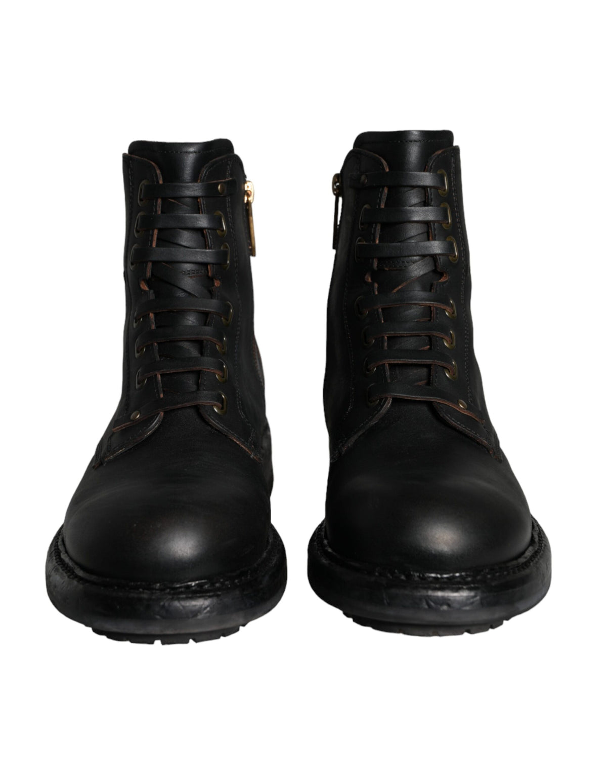 Elevate your style with Dolce & Gabbana's Black Lace Up Mid Calf Boots, crafted from luxurious calf leather, embodying timeless Italian elegance for the discerning individual.