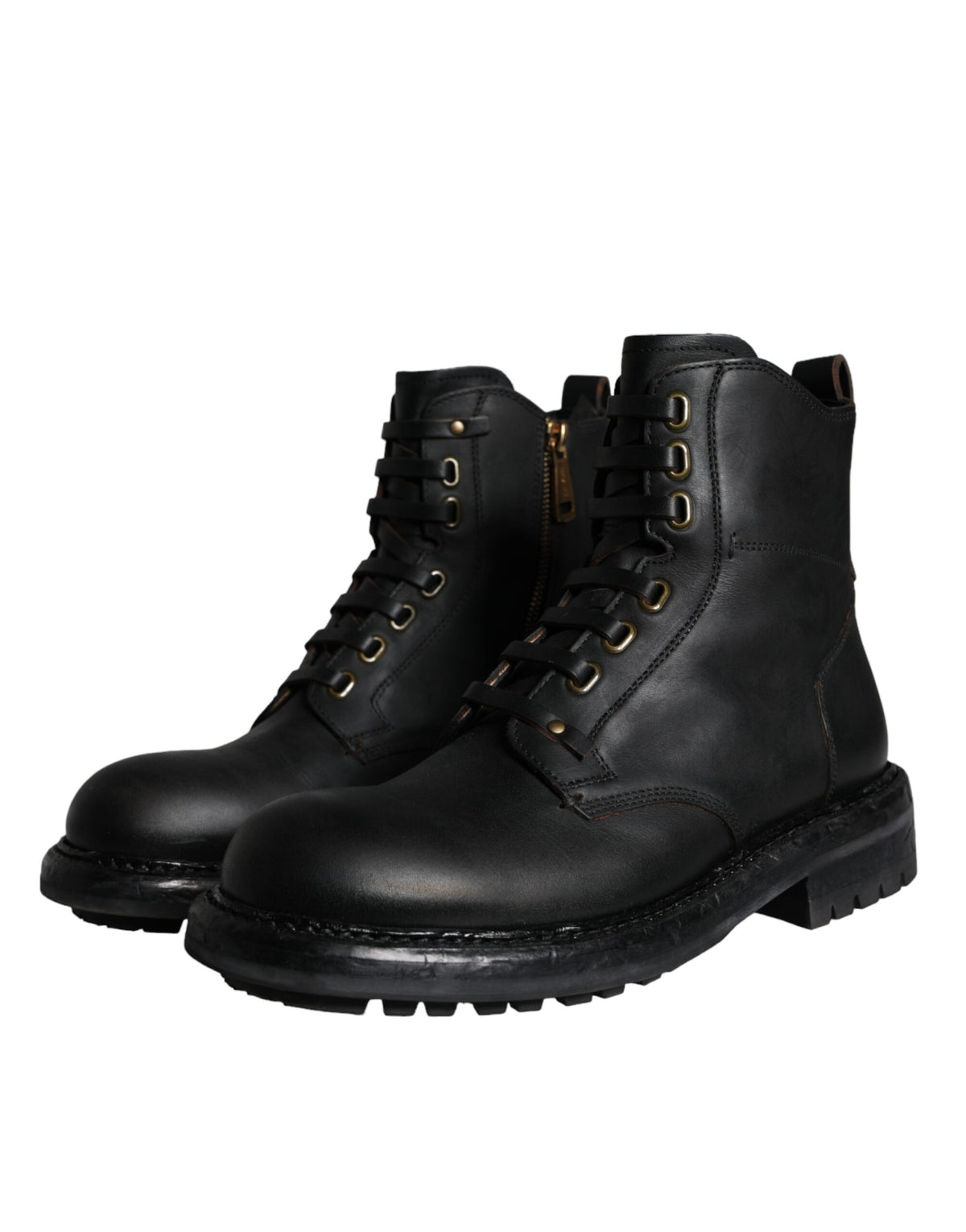 Experience the exquisite Dolce & Gabbana Black Lace Up Mid Calf Boots, crafted from luxurious calf leather, embodying timeless elegance and refined sophistication for the discerning individual.