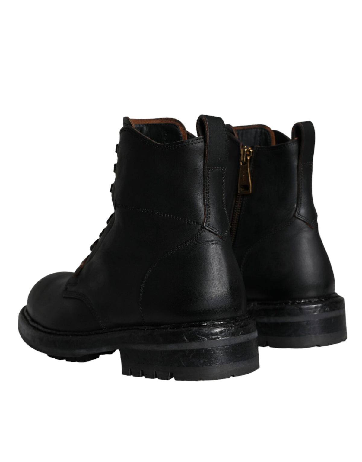 Elevate your style with Dolce & Gabbana's Black Lace Up Mid Calf Boots, crafted from luxurious calf leather, embodying timeless Italian elegance for the discerning individual.