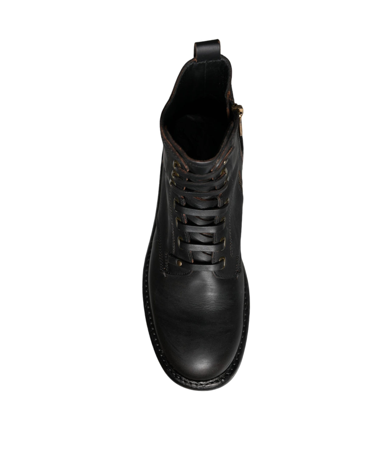 Step into the realm of luxury with Dolce & Gabbana's Black Lace Up Mid Calf Boots, crafted from exquisite calf leather for a timeless elegance that defines sophistication.