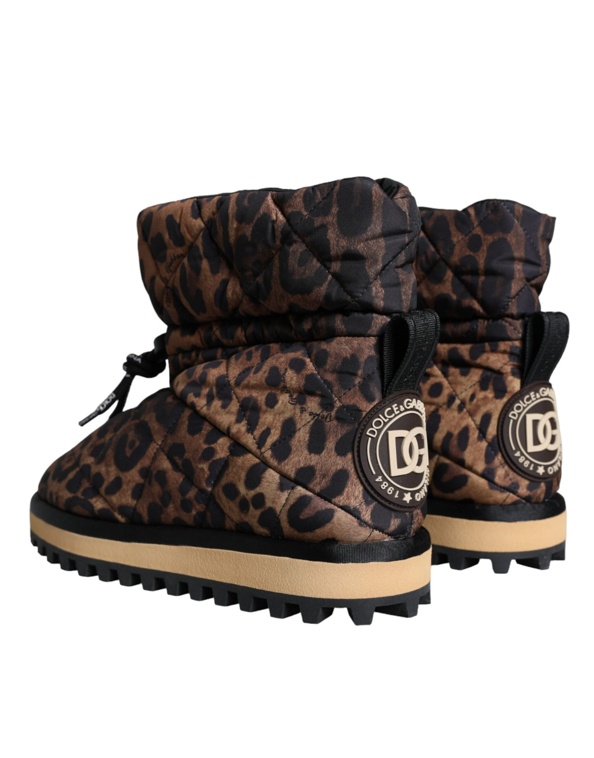 Indulge in the exquisite Dolce & Gabbana Brown Leopard Ankle Boots, crafted from premium nylon in Italy, embodying luxury and timeless elegance for the discerning individual.