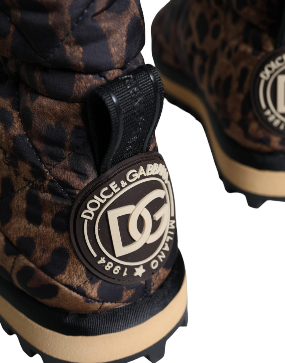 Indulge in the exquisite Dolce & Gabbana Brown Leopard Ankle Boots, crafted from premium nylon in Italy, where bold sophistication meets timeless elegance for the discerning connoisseur.