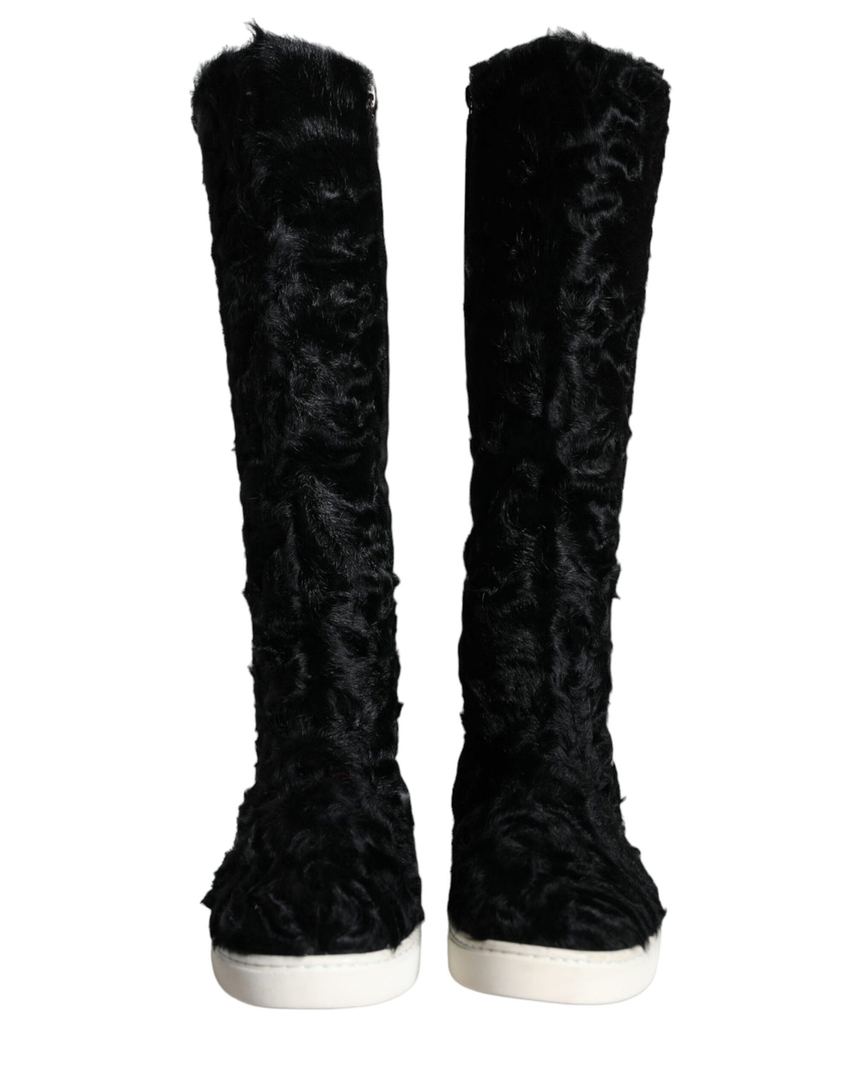 Indulge in the opulent Dolce & Gabbana Black Xiangao Lamb Fur Leather Boots, where exquisite craftsmanship meets luxurious comfort, perfect for the discerning fashion connoisseur.