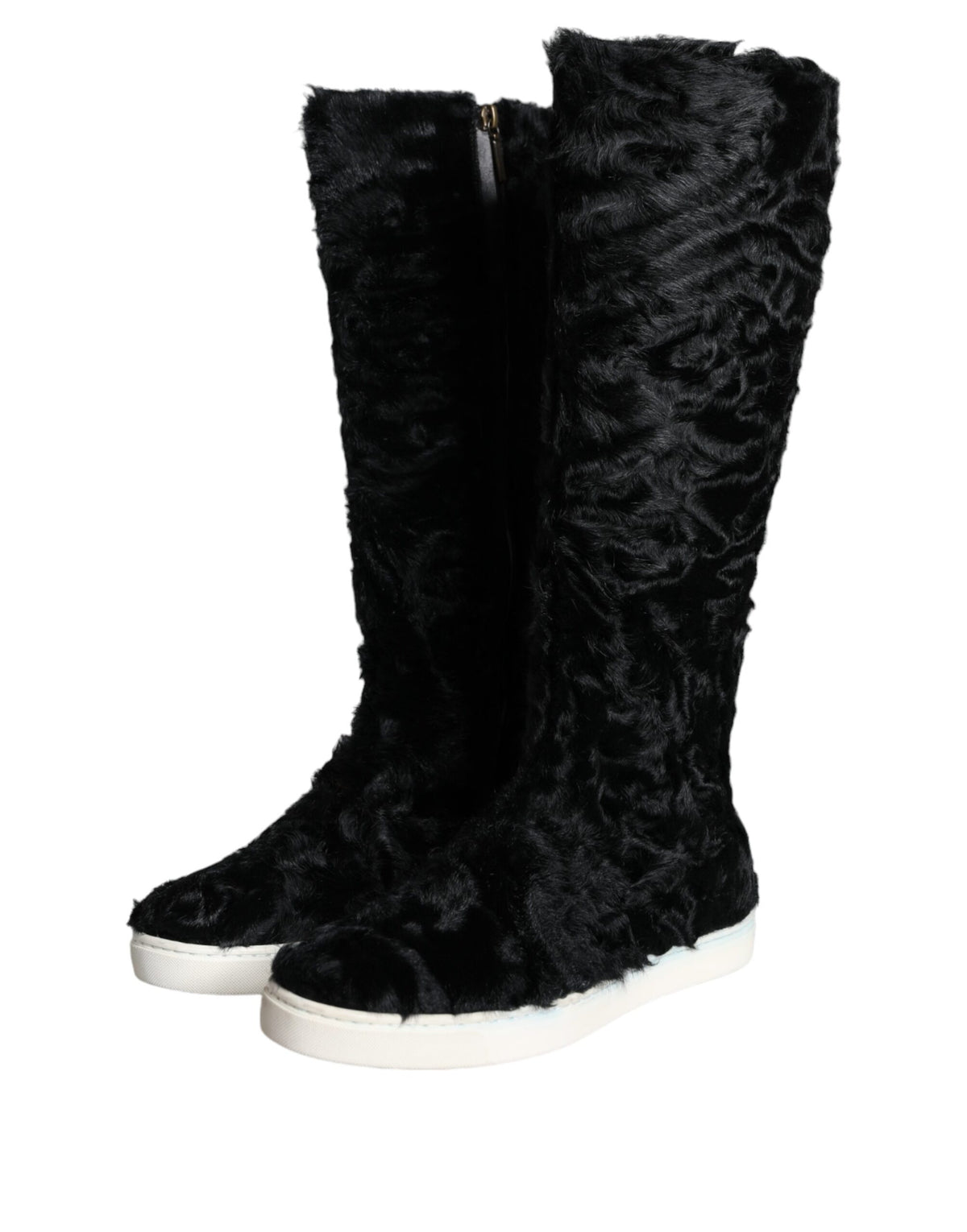 Experience the allure of Dolce & Gabbana Black Xiangao Lamb Fur Leather Boots, where opulent craftsmanship meets timeless elegance for the discerning individual.