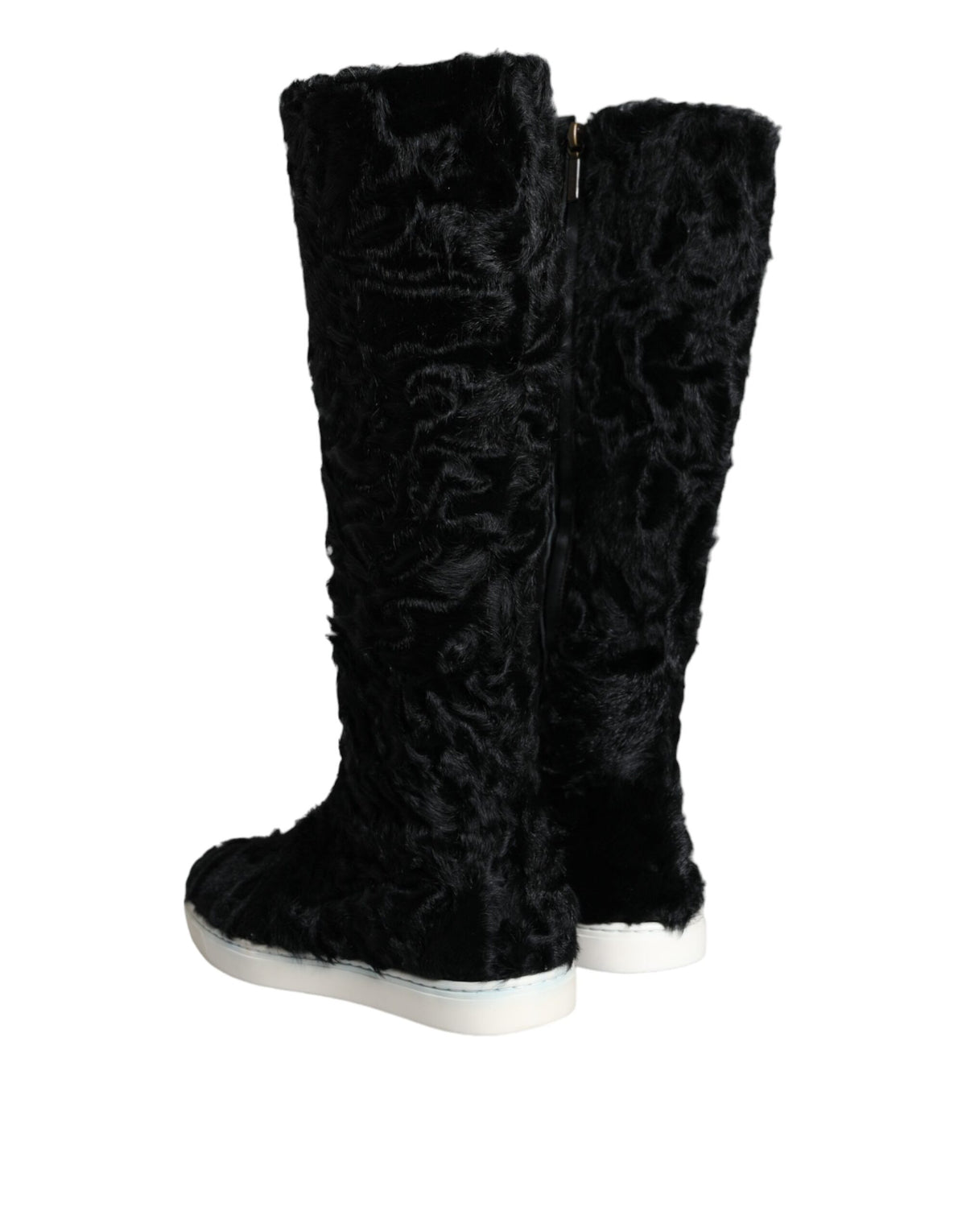 Indulge in the exquisite Dolce & Gabbana Black Xiangao Lamb Fur Leather Boots, where opulent craftsmanship meets timeless elegance, perfect for the discerning fashion connoisseur.