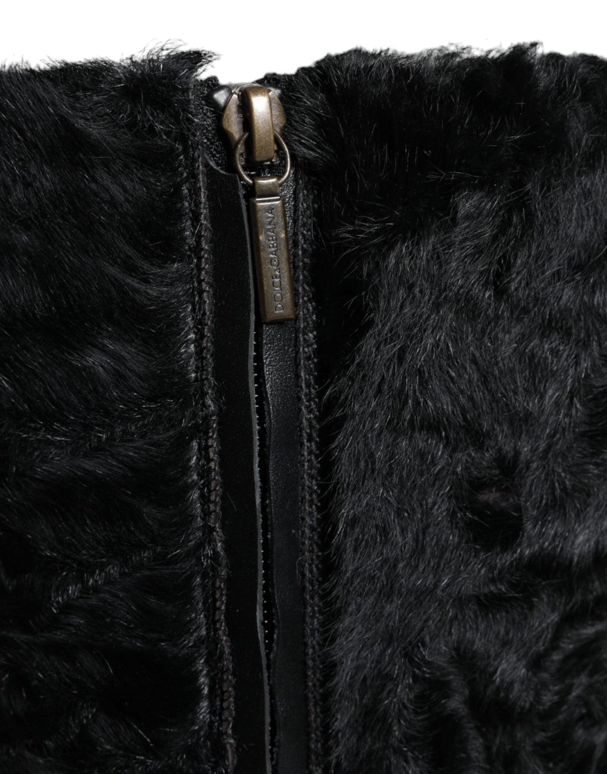 Experience the opulence of Dolce & Gabbana's Black Xiangao Lamb Fur Leather Boots, where exquisite craftsmanship meets timeless elegance, perfect for the discerning fashion connoisseur.