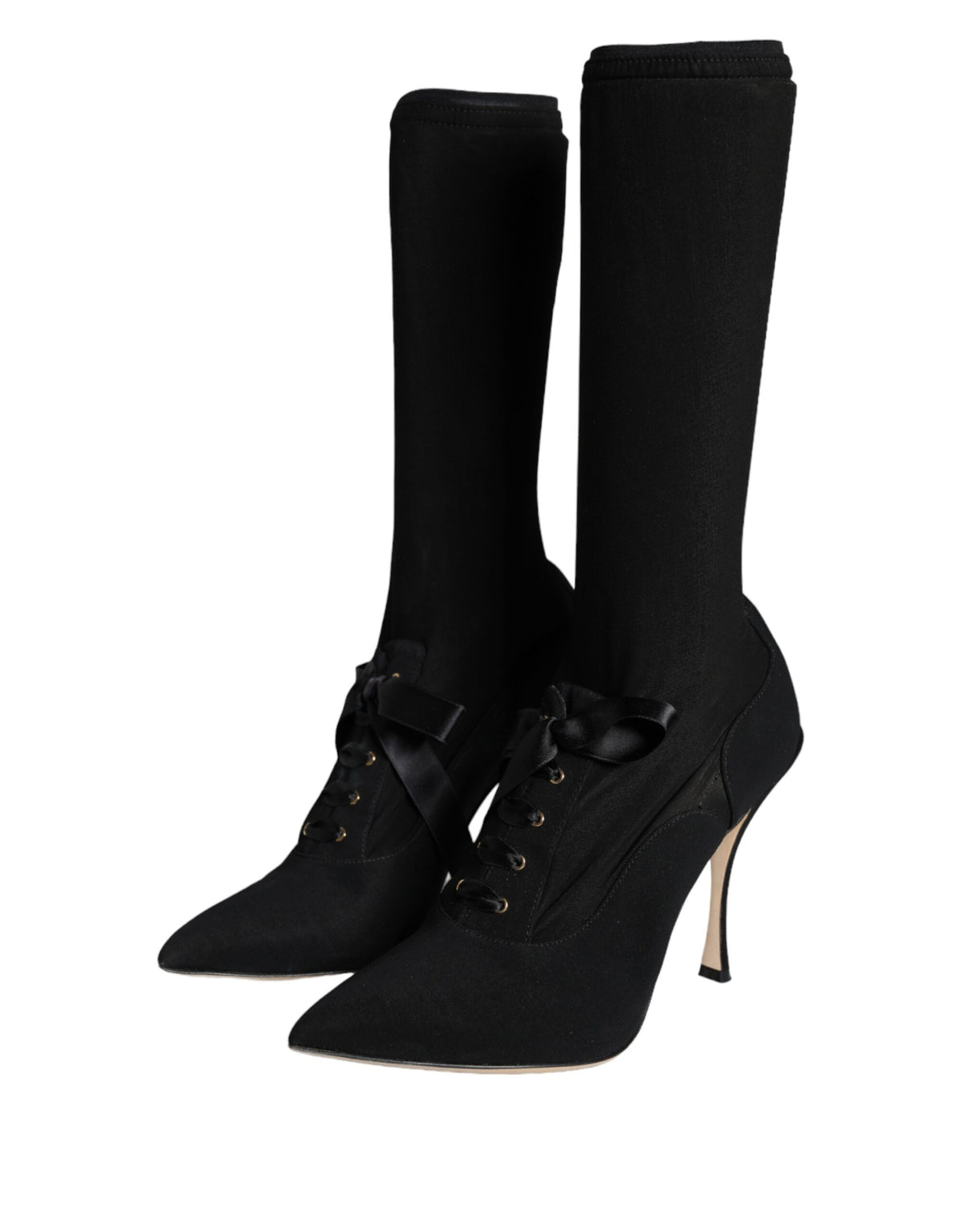 Step into unparalleled elegance with Dolce & Gabbana's Black Stiletto Heels Mid Calf Boots, crafted in Italy from luxurious materials for a transformative style experience.