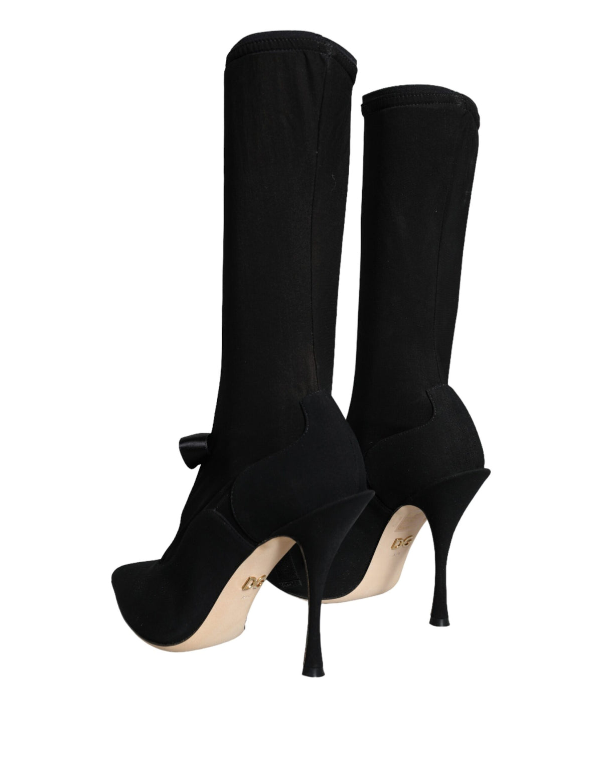 Step into a realm of sophistication with Dolce & Gabbana's Black Stiletto Heels Mid Calf Boots, crafted in Italy from luxurious materials for an exquisite statement.
