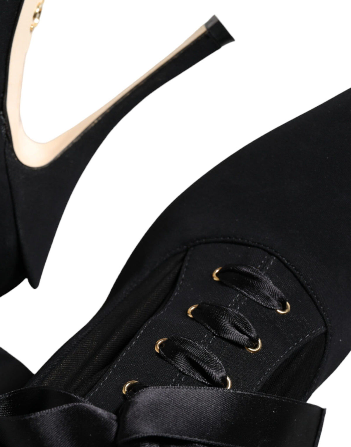 Indulge in the exquisite artistry of Dolce & Gabbana's Black Stiletto Heels Mid Calf Boots, where luxurious materials and Italian craftsmanship elevate your style to new heights.