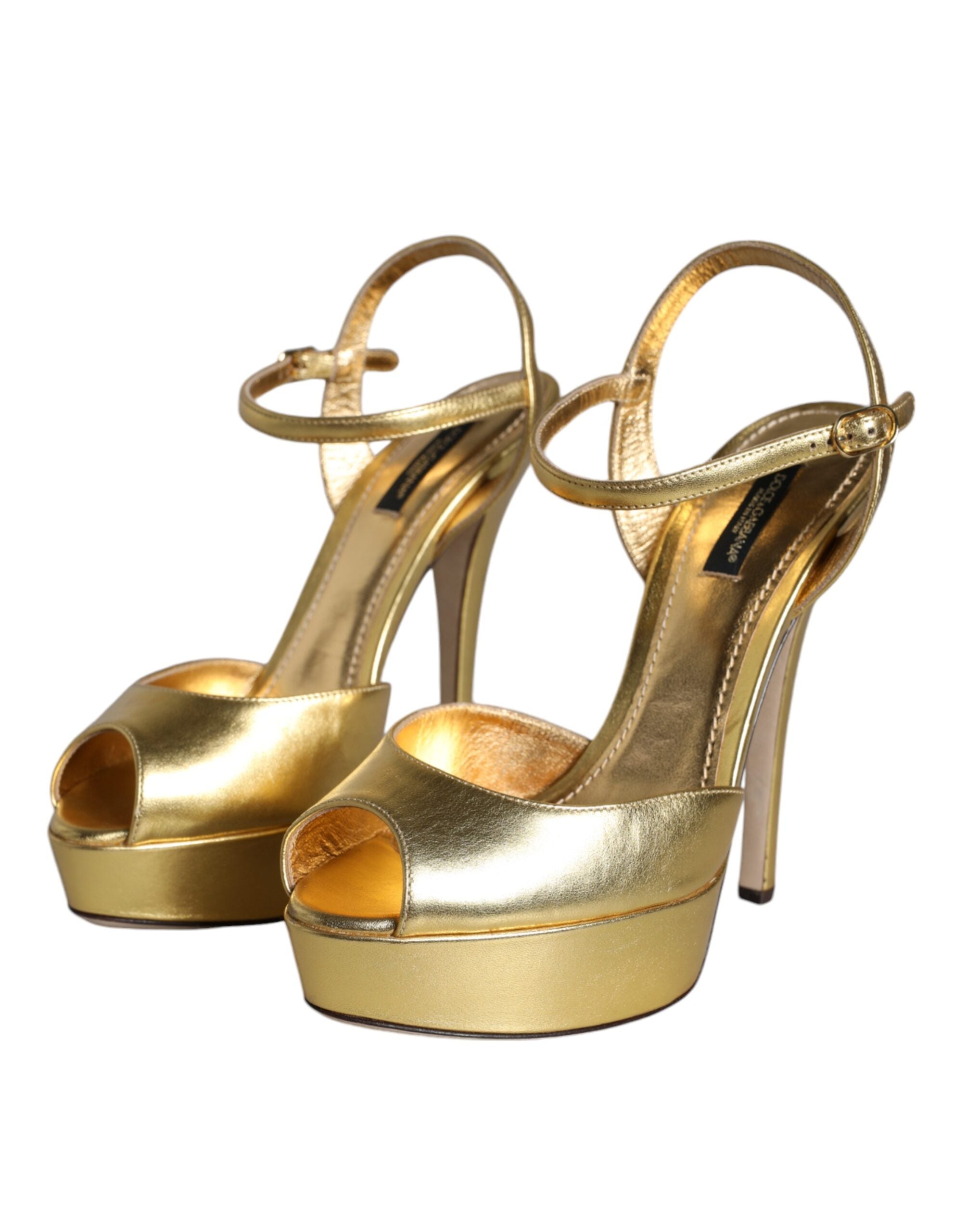 Indulge in the exquisite Dolce & Gabbana Gold Bette Leather Heels, crafted from sumptuous lamb leather, embodying elegance and sophistication for the discerning fashion aficionado.