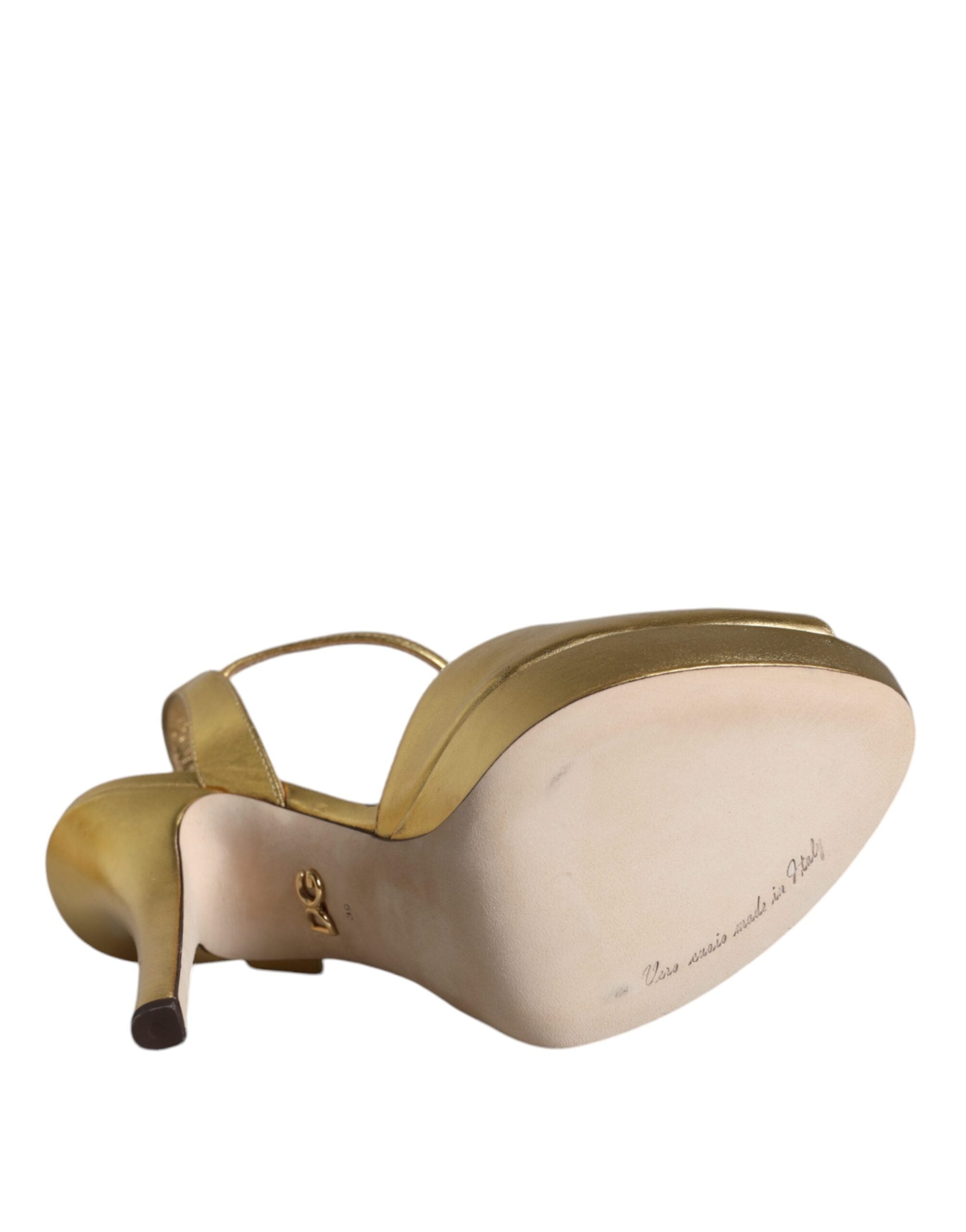 Experience the exquisite allure of Dolce & Gabbana Gold Bette Leather Heels, crafted from sumptuous lamb leather, embodying timeless elegance and artisanal luxury.